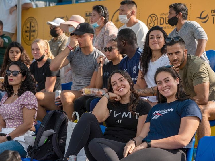 Spectators watch the Throwdown at the Sports, Fitness and Wellbeing Hub, at Expo 2020 Dubai. From Friday, wearing masks outdoors has been made optional, signalling a move towards normality.