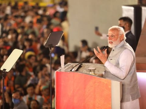 India's Prime Minister Narendra Modi addresses party supporters at the BJP Headquarters during a celebration following the party's win in Assembly elections of Uttar Pradesh and others states, in New Delhi on Thursday. 