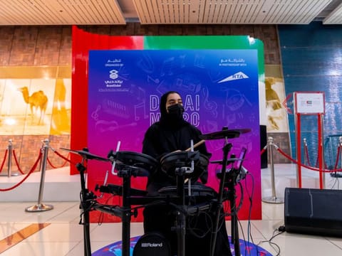 Emirati drummer Maitha Al Mansoori perform as part of the Dubai Metro Music Festival