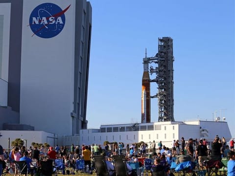  NASA's next-generation moon rocket, the Space Launch System (SLS) rocket with its Orion crew capsule perched on top, makes a highly anticipated, slow-motion journey from the Vehicle Assembly Building (VAB) to its launch pad at Cape Canaveral, Florida.