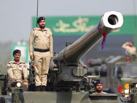 Pakistani soldiers are pictured on a tank during the Pakistan Day military parade in Islamabad, Pakistan, March 23, 2022. 