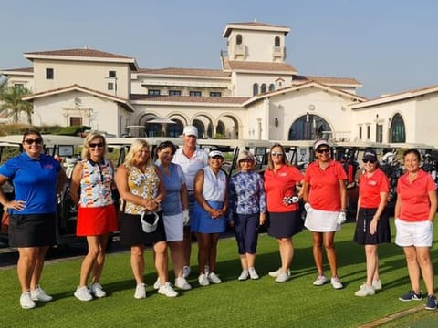 Desert Rose Golfing Society golfers look a happy bunch during their stay at Yas Links in Abu Dhabi. 