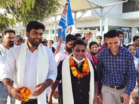 Venzy Viegas with supporters following his victory in Benaulim constituency on March 10, 2022.