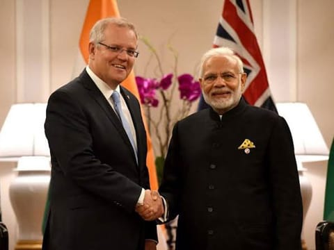 The pact will give greater market access and slash duties on a range of goods including, sheep meat, wool, wine, coal, alumina and metallic ores, sold by Australia in India.