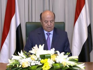 Yemen president cedes powers to council as Saudi Arabia pushes to end war