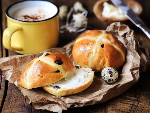 This story is very little bit about the popular nursery rhyme 'hot cross buns' of the 1700s, and more about the doughy, fruit-studded, spiced yet sweet bun in the song