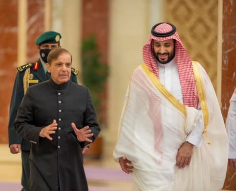 Saudi Crown Prince Mohammad bin Salman meets Pakistan's Prime Minister Shehbaz Sharif upon his arrival in Jeddah on April 29, 2022.  