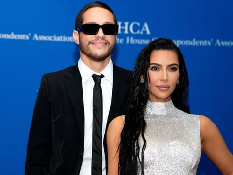 US comedian Pete Davidson (L) and US television personality Kim Kardashian arrive for the White House Correspondents Association gala at the Washington Hilton Hotel in Washington, DC, on April 30, 2022. (Photo by Stefani Reynolds / AFP)