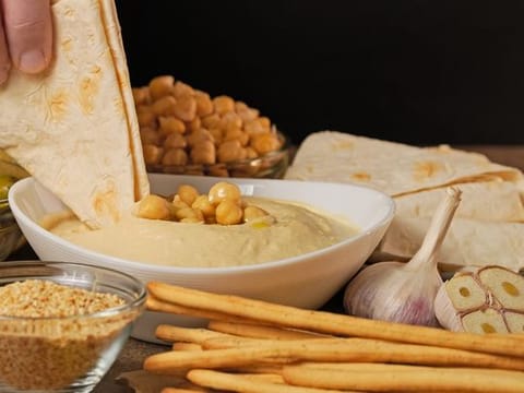 Garlic holds the power to transform a dish due to its pungent and earthy taste, which sweetens up when cooked
