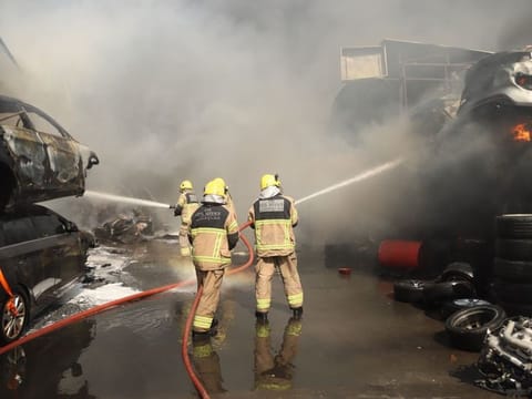 Sharjah Civil Defence personnel at work.