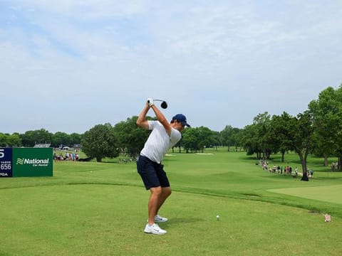 Scottie Scheffler of the United States, world No.1 and winner at the Masters last month, plays his shot from the fifth tee during a practice round prior to the start of the 2022 PGA Championship at Southern Hills Country Club  in Tulsa, Oklahoma.