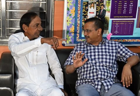 Delhi Chief Minister Arvind Kejriwal interacts with his Telangana counterpart K Chandrashekar Rao during their visit to Sarvodaya Vidyalaya, South Moti Bagh, in New Delhi on Saturday. 