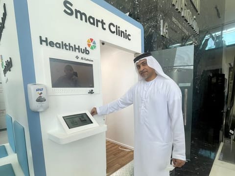 Dr Haidhar Saeed Al Yousuf, managing director of Al Futtaim Health, demonstrating the simple registration process at the first Smart Clinic