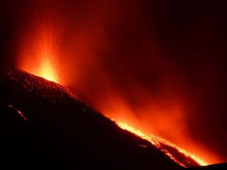 Italy's Mount Etna lights up night sky in stunning eruption