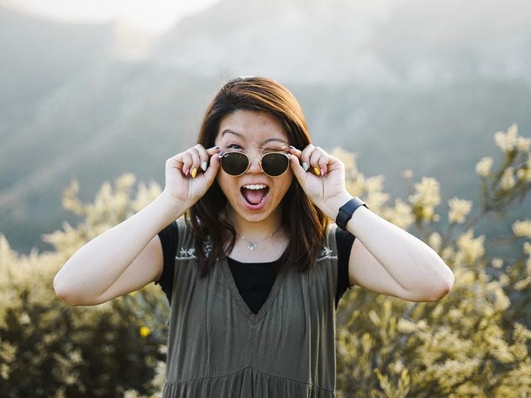 Playfulness benefits for adults winking smiling 