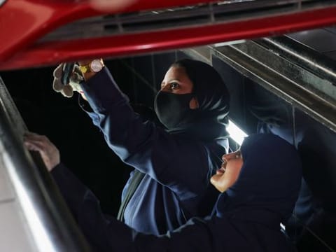 Look: Saudi women move from behind wheel to under the hood