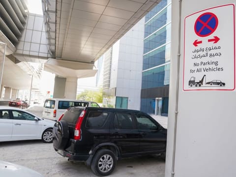 Vehicles parked under a Dubai Metro viaduct. RTA has cautioned motorists not to park their vehicles under Metro viaducts.  