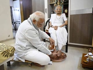 Photos: India's PM Narendra Modi meets mother Heeraben Modi on her 100th birthday