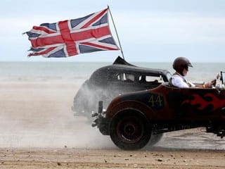 Photos: British classic car lovers take part in the 'Race The Wave'  
