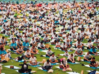 In pictures: Thousands participate in largest-ever yoga event in Abu Dhabi