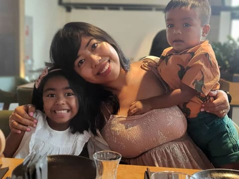 Elida Loresca-Shahabuddin with her children.