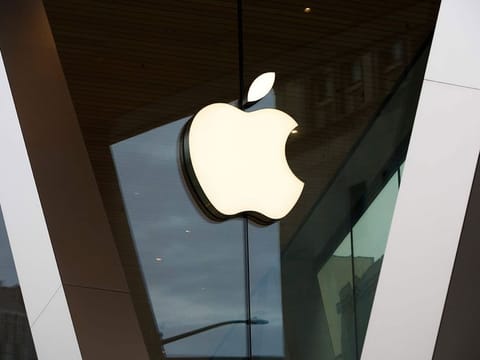 An Apple logo adorns the facade of the downtown Brooklyn Apple store in New York. 
