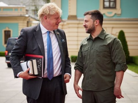 Ukrainian President Volodymyr Zelenskyy and Britain’s Prime Minister Boris Johnson meet in downtown Kyiv, Ukraine, on June 17, 2022. Johnson may have been shown the door in Britain, but he remains a popular figure in Ukraine, where he is widely admired for his uncompromising support for the country’s effort to defeat Russia. 