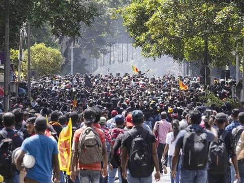 Tear gas is used to disperse anti-government demonstrators outside prime minister's office in Colombo, Sri Lanka, on July 13, 2022. 