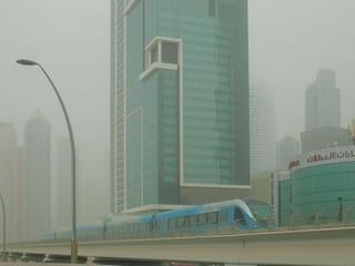UAE weather in pictures: Dust storm and rain sweep many parts of the country