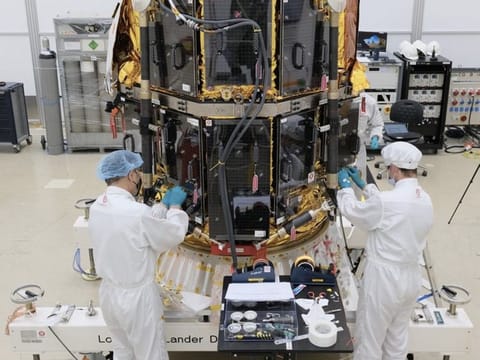 Ispace engineers assemble the M1 flight model at IABG GmbH Space Centre in Germany.