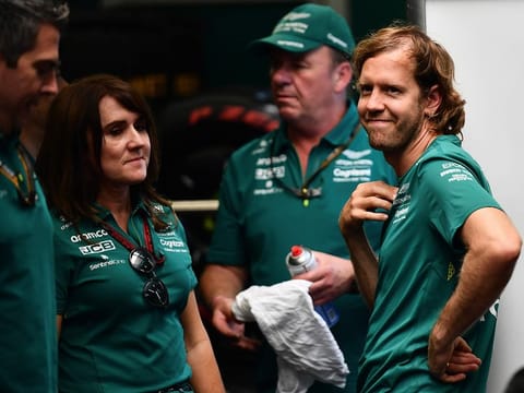 Sebastian Vettel (right) with members of the Aston Martin camp ahead of the F1 Hungarian GP on Sunday. 