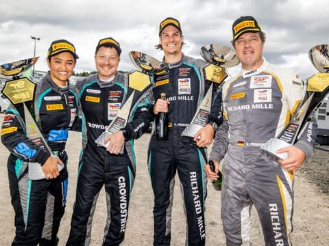 Saudi racer Reema Juffali with her SPS Automotive Performance team members after winning the Bronze Cup class at the 24 Hours of Spa in Belgium.