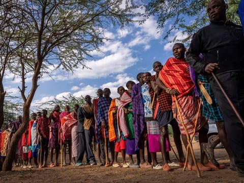 Maasai wait to cast their votes in the general election at a polling station in Esonorua Primary School, in Kajiado County, Kenya, on August 9, 2022. As an emerging global information and communication technology hub, Kenya today is considered one of the most innovative countries in Africa. 