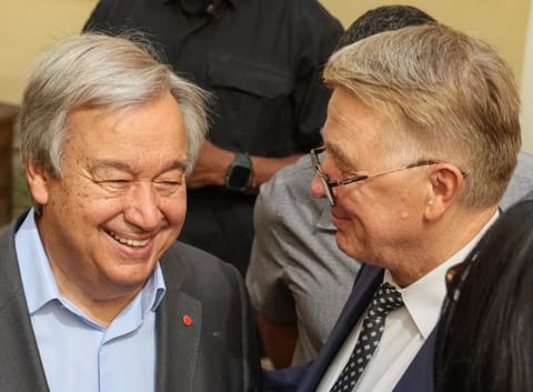 United Nations Secretary-General Antonio Guterres speaks with Rector Volodymyr Melnyk during a visit to the Ivan Franko National University of Lviv, as Russia's attack on Ukraine continues, in Lviv, Ukraine August 18, 2022.