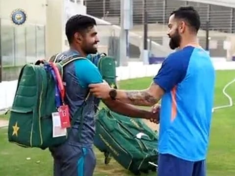Pakistan skipper Babar Azam and former India captain Virat Kohli have a chat at the ICC Academy in Dubai on August 24, 2022, ahead of the DP World Asia Cup. 