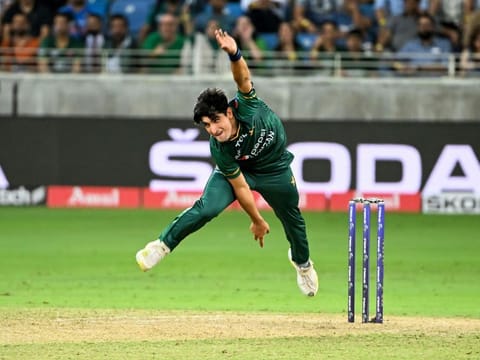 Pakistan pace bowler Naseem Shah in action against India in a Group A match of the DP World Asia Cup at the Dubai International Stadium on August 28, 2022.