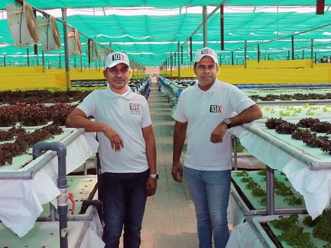 Sukesh Govindan (right), CEO of Tenx Software Foundations, and Madhuker Ganji, CTO of Tenx Software Foundations at client Armela Farms’ facility