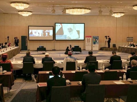 Sheikh Abdullah Bin Bayyah, President of the Abu Dhabi Forum for Peace, gives his welcome address at the First Multi-Religious Peace Roundtable, in Tokyo, Japan. Bin Bayyah noted that the UAE was first country to establish a ministry of tolerance and co-existence and made  the values of peace, harmony, negotiations and dialogue one of ''The 10 principles for the next 50 years''. 