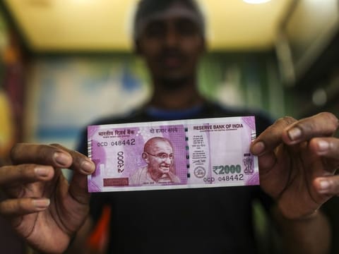  The Indian rupee will remain at its current level three months from now and gain only marginally by the end of February 2024, barely recouping any of its losses from last year, a Reuters poll of foreign exchange strategists found.