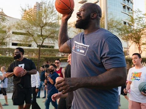 Shaquille O'Neal made a surprise visit to Reem Central Park and played basketball with kids.