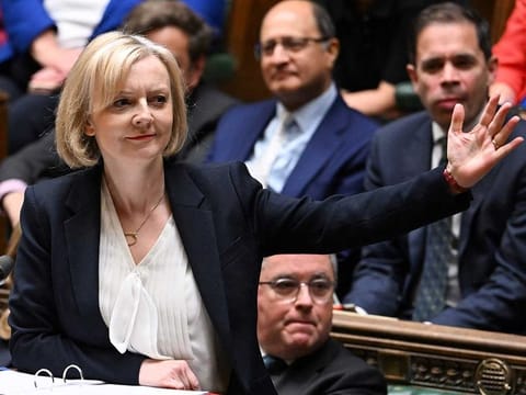 A handout photograph released by the UK Parliament shows Britain's Prime Minister Liz Truss speaking during Prime Minister's Questions in the House of Commons in London on October 19, 2022.  
