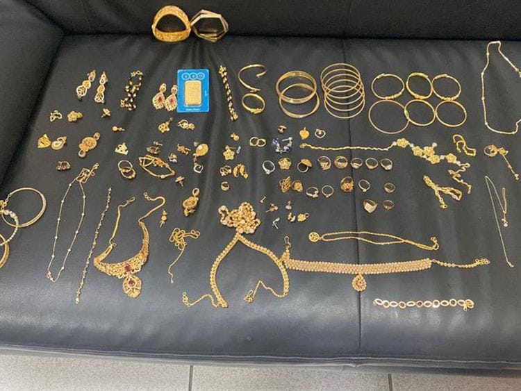 Ajman Police return stolen jewellery to family