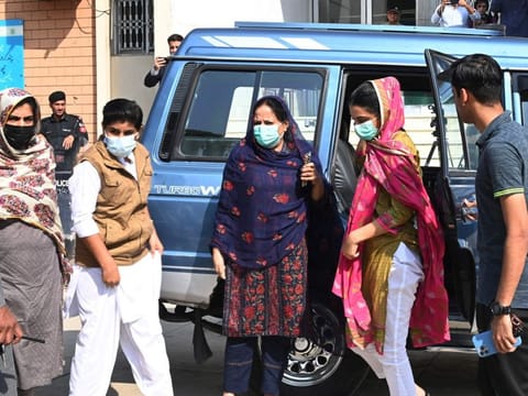 Relatives Arshad Sharif arrive at a hospital to see his remains in Islamabad on October 26, 2022.  