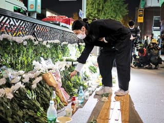 In pictures: South Korea in mourning after crowd crush kills 153 at Halloween party