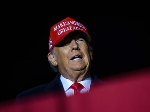 Former US President Donald Trump speaks during a campaign event at Sioux Gateway Airport on November 3, 2022 in Sioux City, Iowa. Trump held the rally to support for Iowa GOP candidates ahead of the state's midterm election on November 8. 