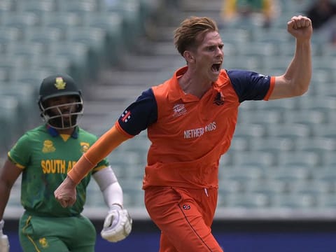 Netherlands' Fred Klaassen (right) celebrates the wicket of South Africa's Quinton de Kock during the ICC men's Twenty20 World Cup 2022 cricket match between Netherlands and South Africa at Adelaide Oval. The Netherlands won by 13 runs and the result means India have qualified for the semi-finals. 