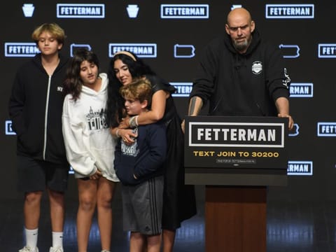 Democratic Senate candidate John Fetterman speaks to supporters with his family during an election night party at StageAE on November 9, 2022 in Pittsburgh, Pennsylvania. Fetterman defeated Republican Senate candidate Dr. Mehmet Oz. 