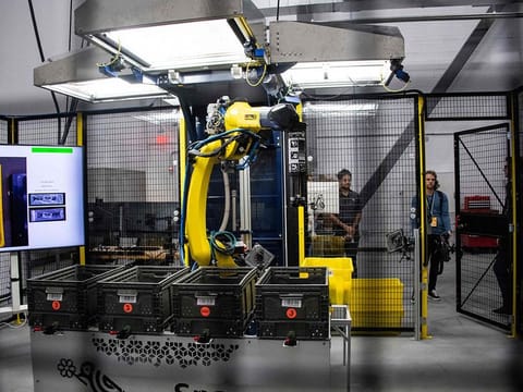 The sparrow robot is able to pick up unpackaged items to sort them at Amazon's BOS27 Robotics Innovation Hub.
