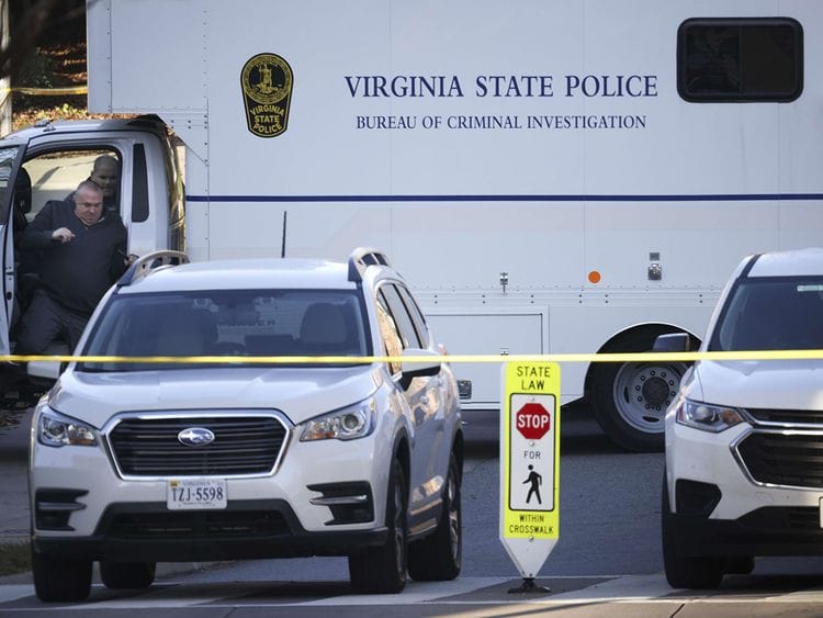 A Virginia State Police criminal investigation truck is shown at the crime scene where 3 people were killed and 2 others wounded on the grounds of the University of Virginia on November 14, 2022 in Charlottesville, Virginia.  