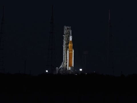 The Artemis 1 moon rocket and the Orion spacecraft sit poised on Launch Pad 39B.
